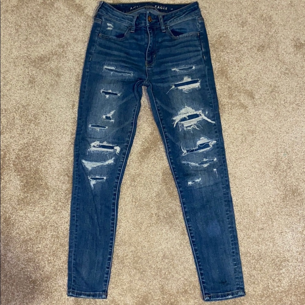 American Eagle skinny jeans with patches in rips